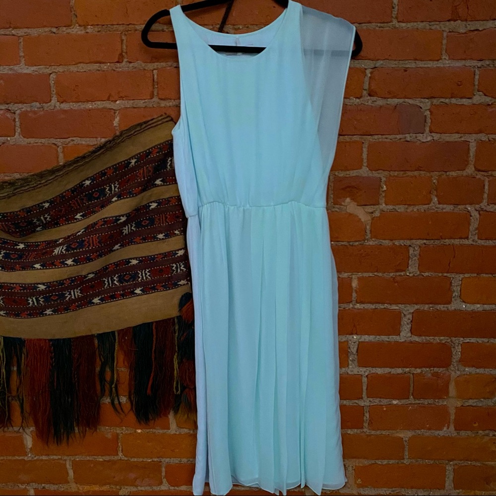 SANDRO 100% Silk Sheer lined Mint green asymmetric Dress 
Size Small/Medium EUC